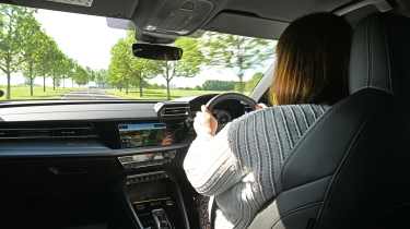 Sarah Perks driving in the Audi A3